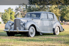 1952 Bentley R-Type LHD Automatic B450LSR Odometer: 34,432 miles. Older restoration showing very well. Tudor gray over silver; light gray/dark gray piping. Originally delivered to France; first owner purchased for his wedding tour of Europe, afterward imported to the United States. Presented as per build sheet: original colors, white walls, Pyrene bumpers with large overriders specific to few cars to the export market; repeaters without trafficators (deleted); high frequency horns; sealed beam headlights. Owners manual; all large tools with a mostly complete small tool tray. Extensive history/receipt file. A very special Early Post War Bentley.