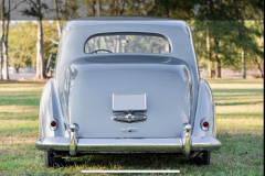 1952 Bentley R-Type LHD Automatic B450LSR Odometer: 34,432 miles. Older restoration showing very well. Tudor gray over silver; light gray/dark gray piping. Originally delivered to France; first owner purchased for his wedding tour of Europe, afterward imported to the United States. Presented as per build sheet: original colors, white walls, Pyrene bumpers with large overriders specific to few cars to the export market; repeaters without trafficators (deleted); high frequency horns; sealed beam headlights. Owners manual; all large tools with a mostly complete small tool tray. Extensive history/receipt file. A very special Early Post War Bentley.